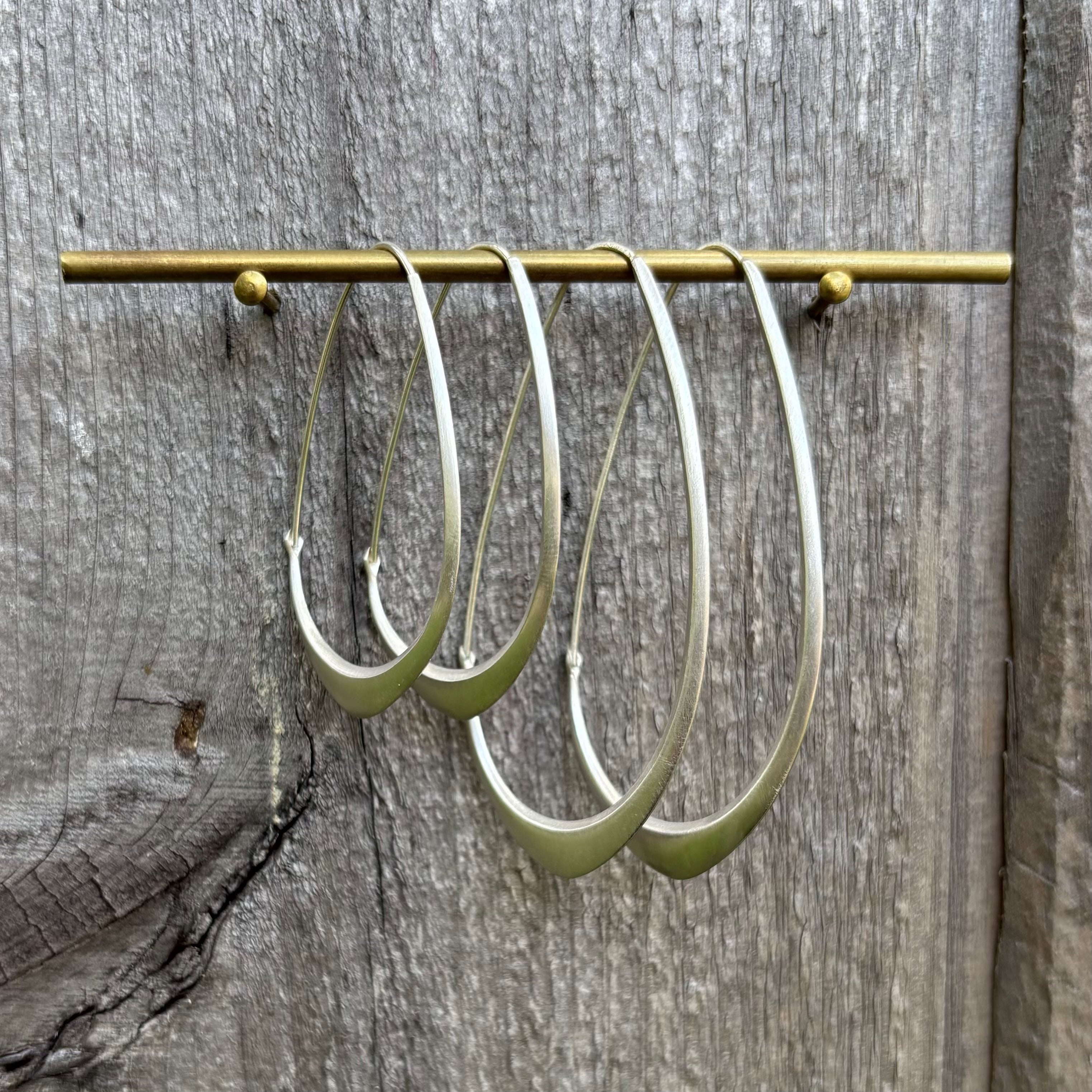 Medium Facet Hoops in Bright Sterling Silver
