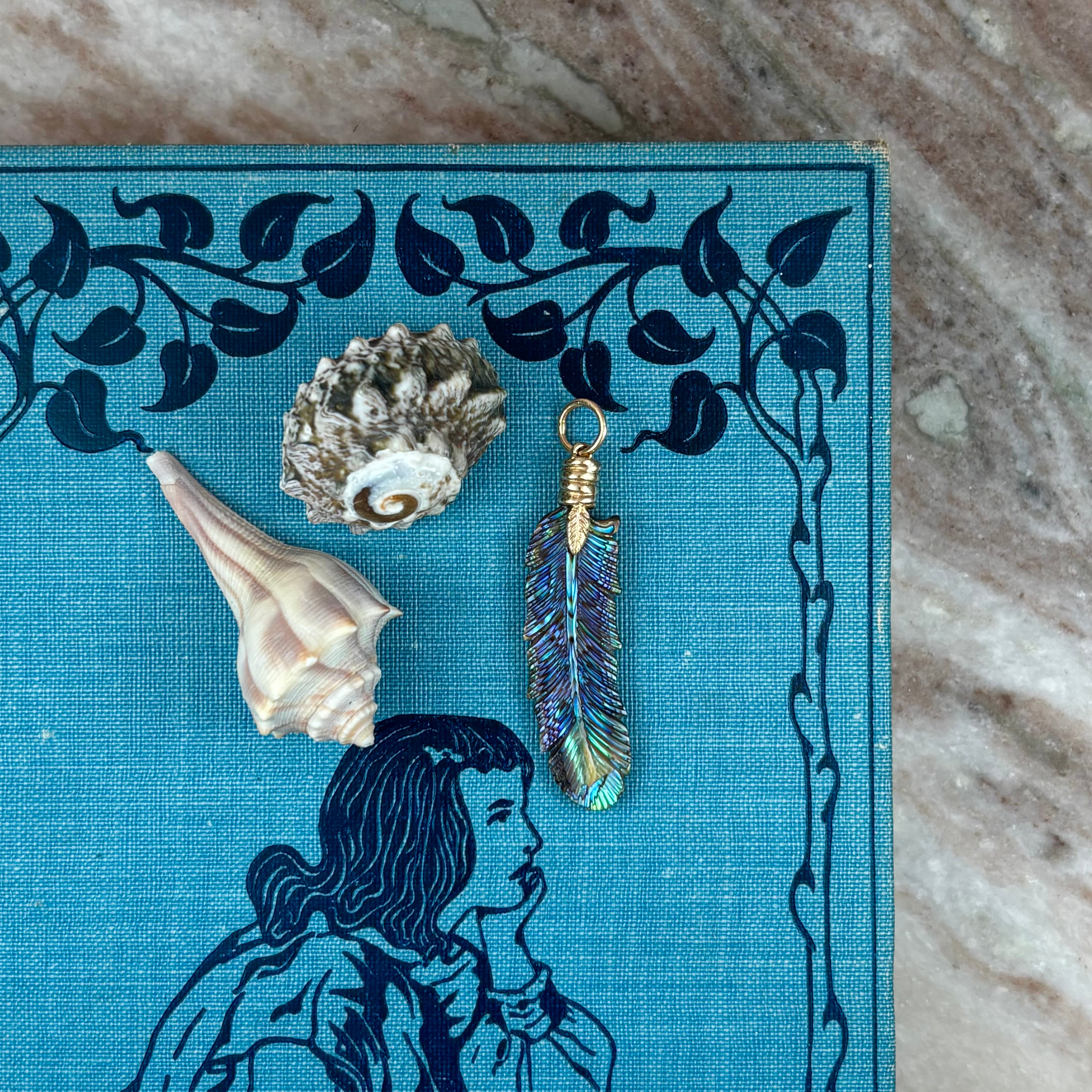 Luminescent Feather Charm