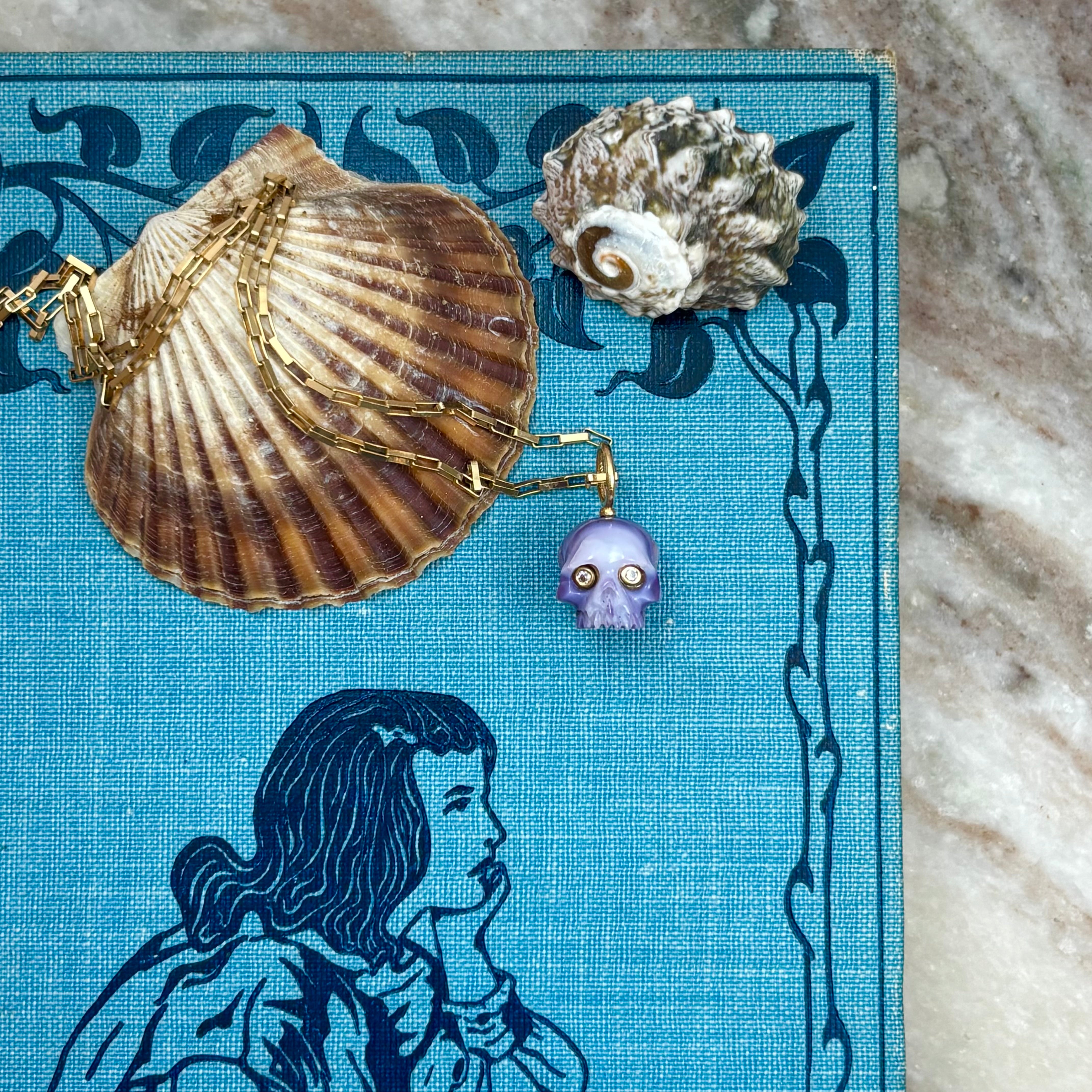 Purple Clam Shell Skull Baby