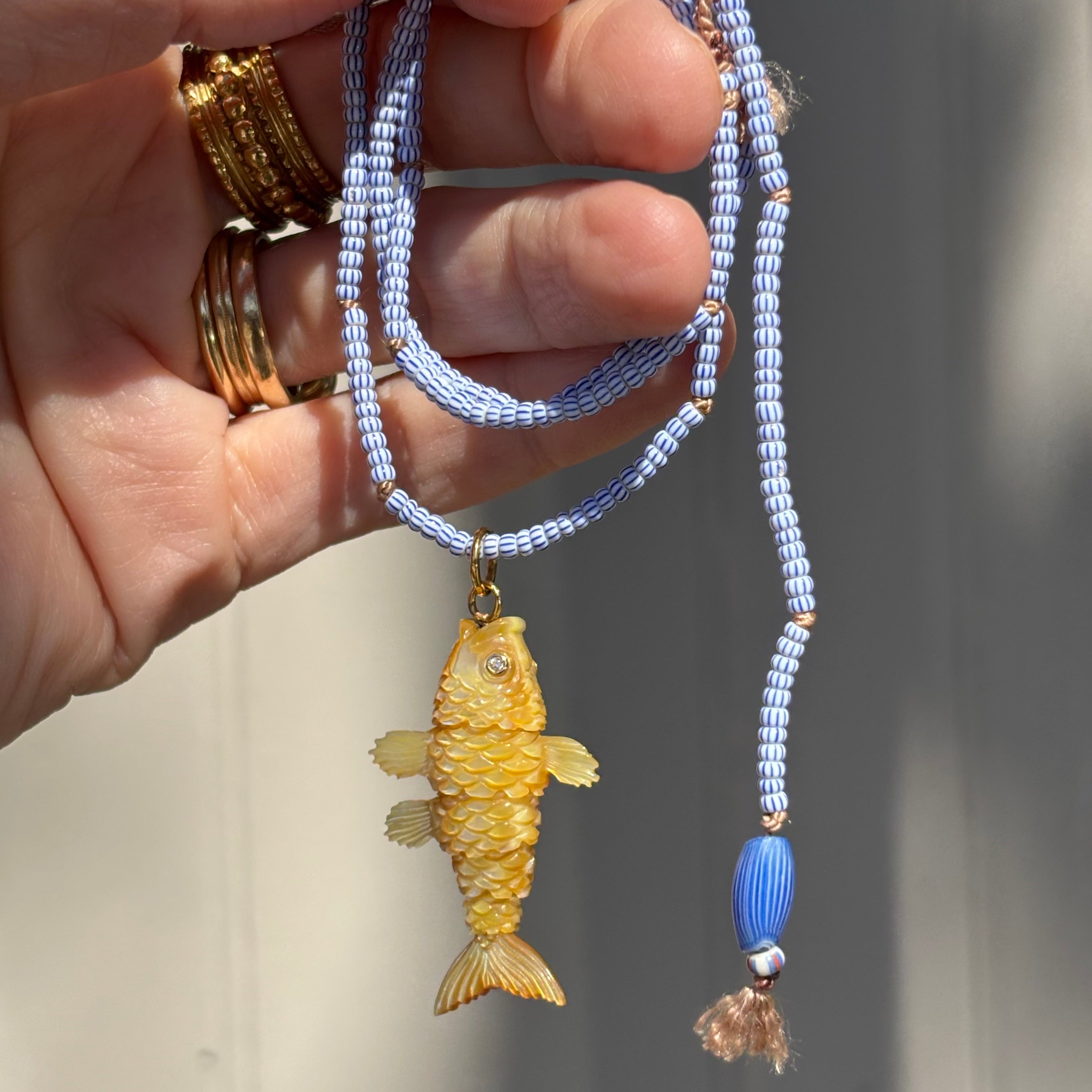 Articulated Fish in Golden Mother of Pearl Pendant
