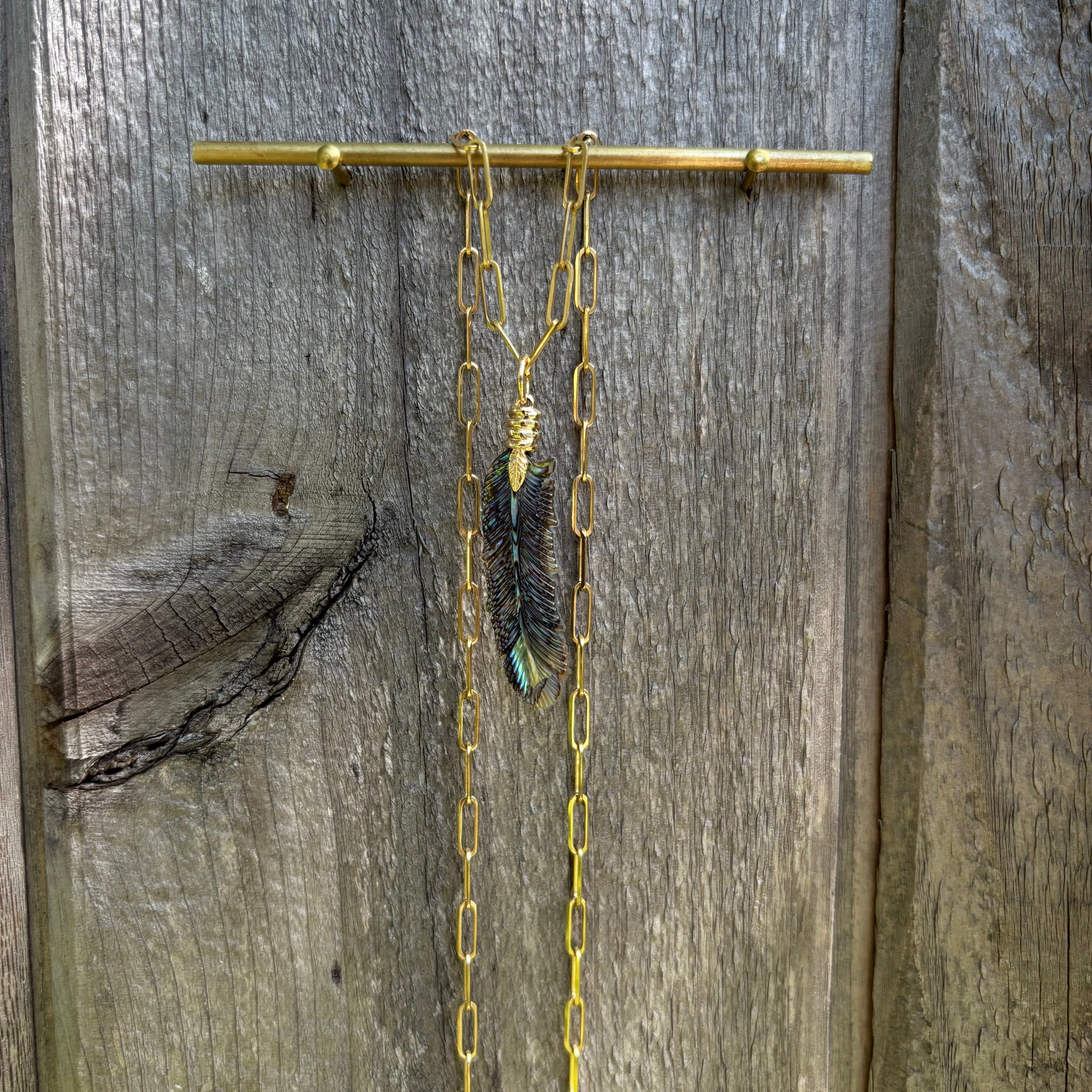 Luminescent Feather Charm