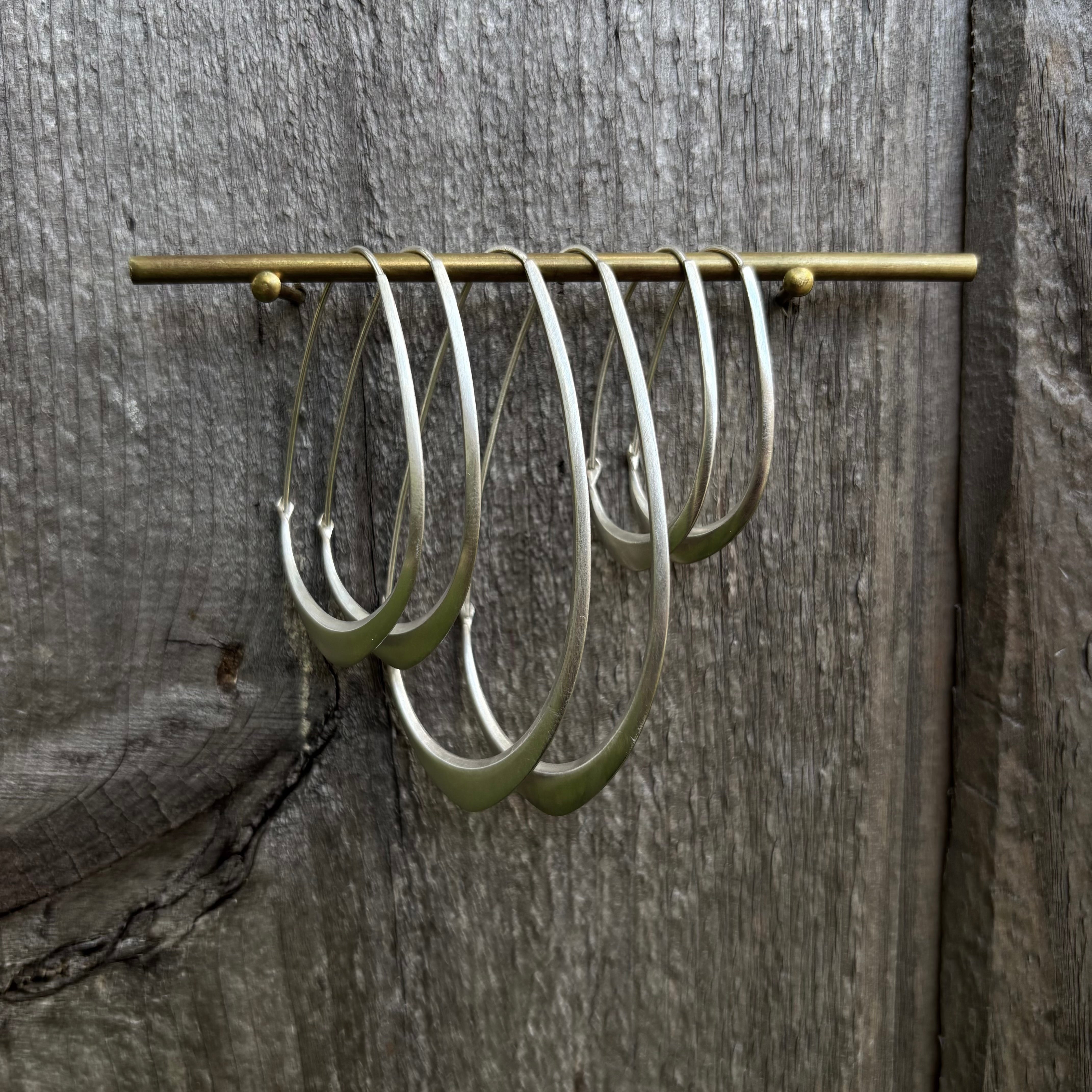 Medium Facet Hoops in Bright Sterling Silver