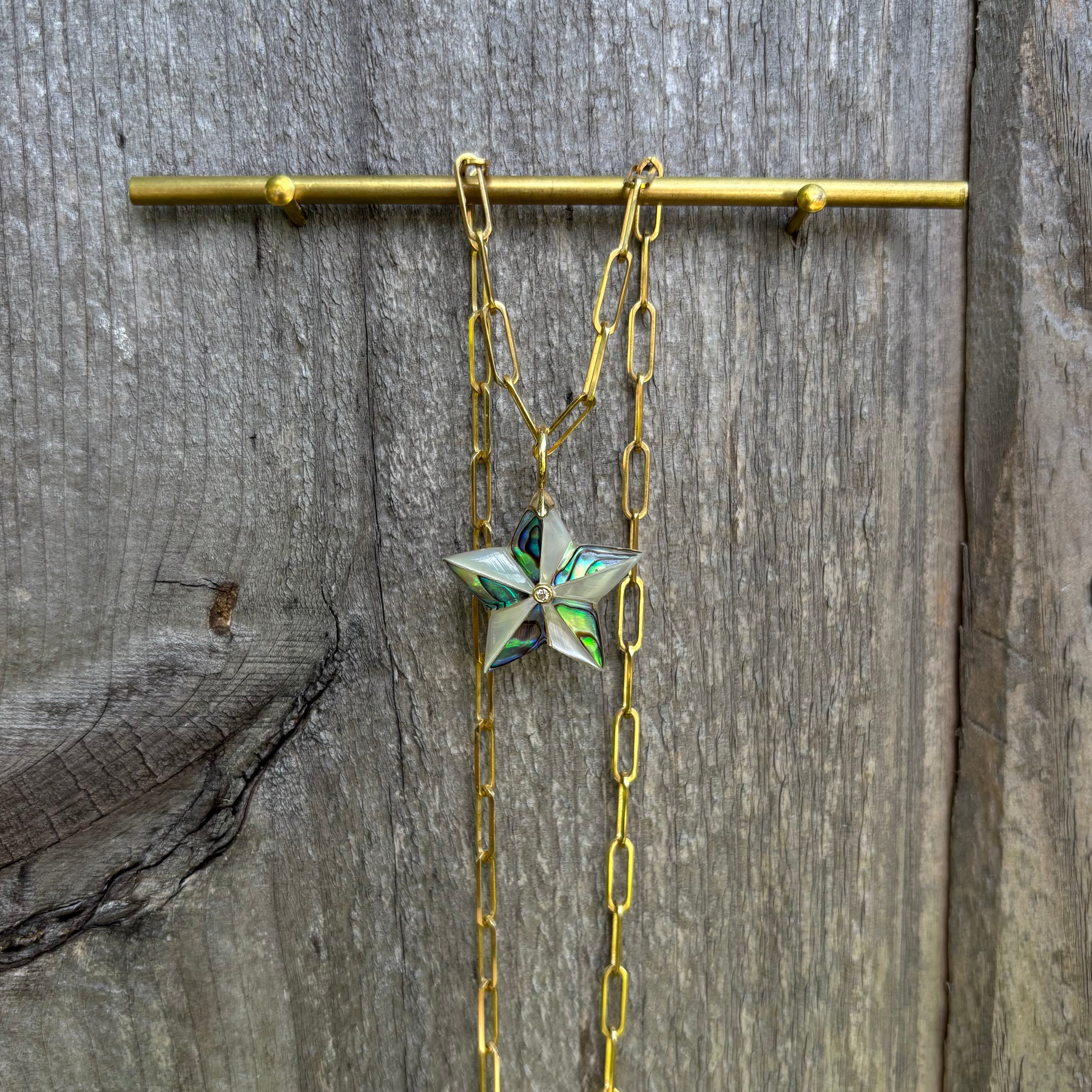 Beveled Luminescent Star Charm